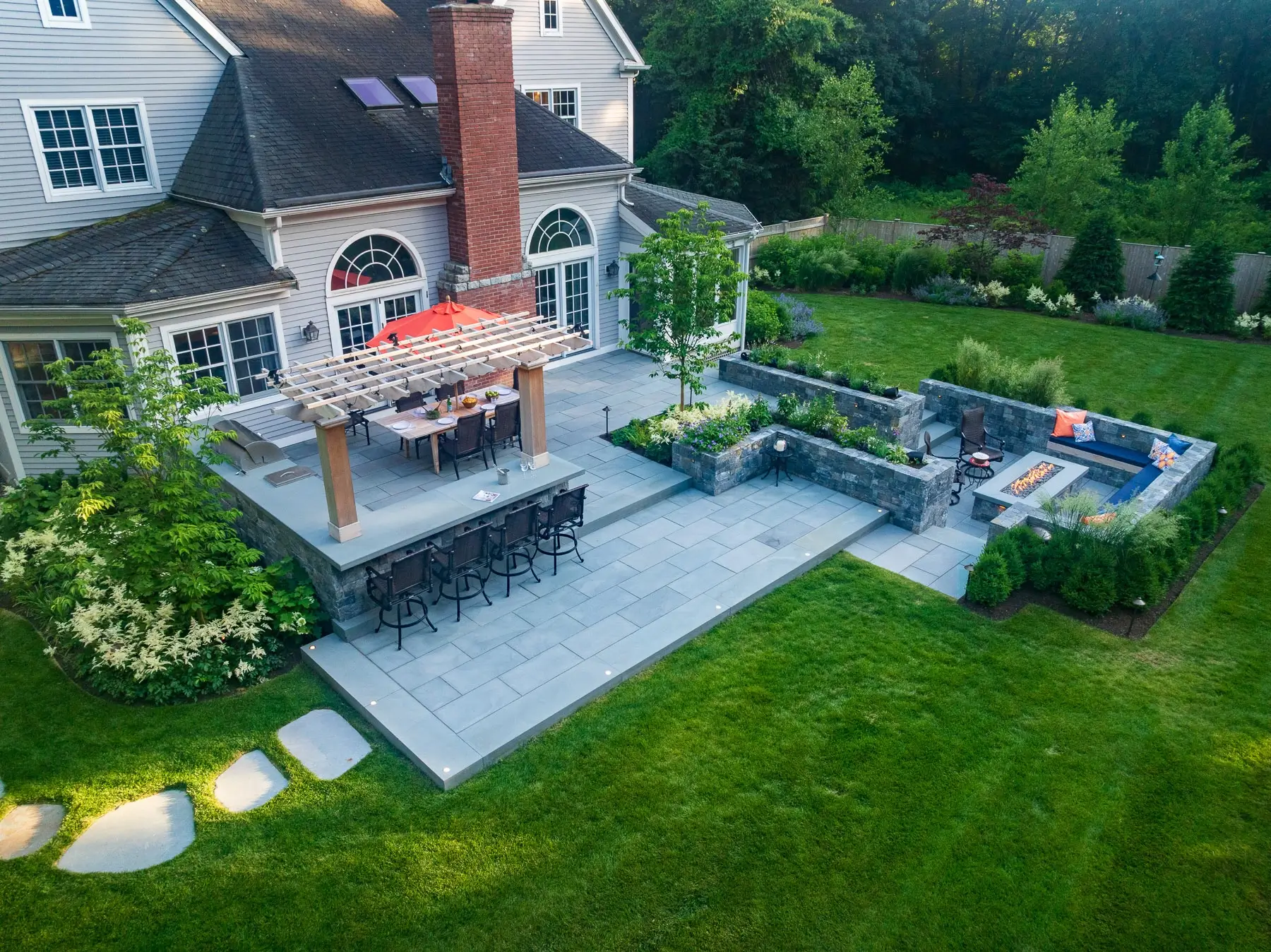 A lush green lawn in Weston, ma maintained by Lynch Landscape